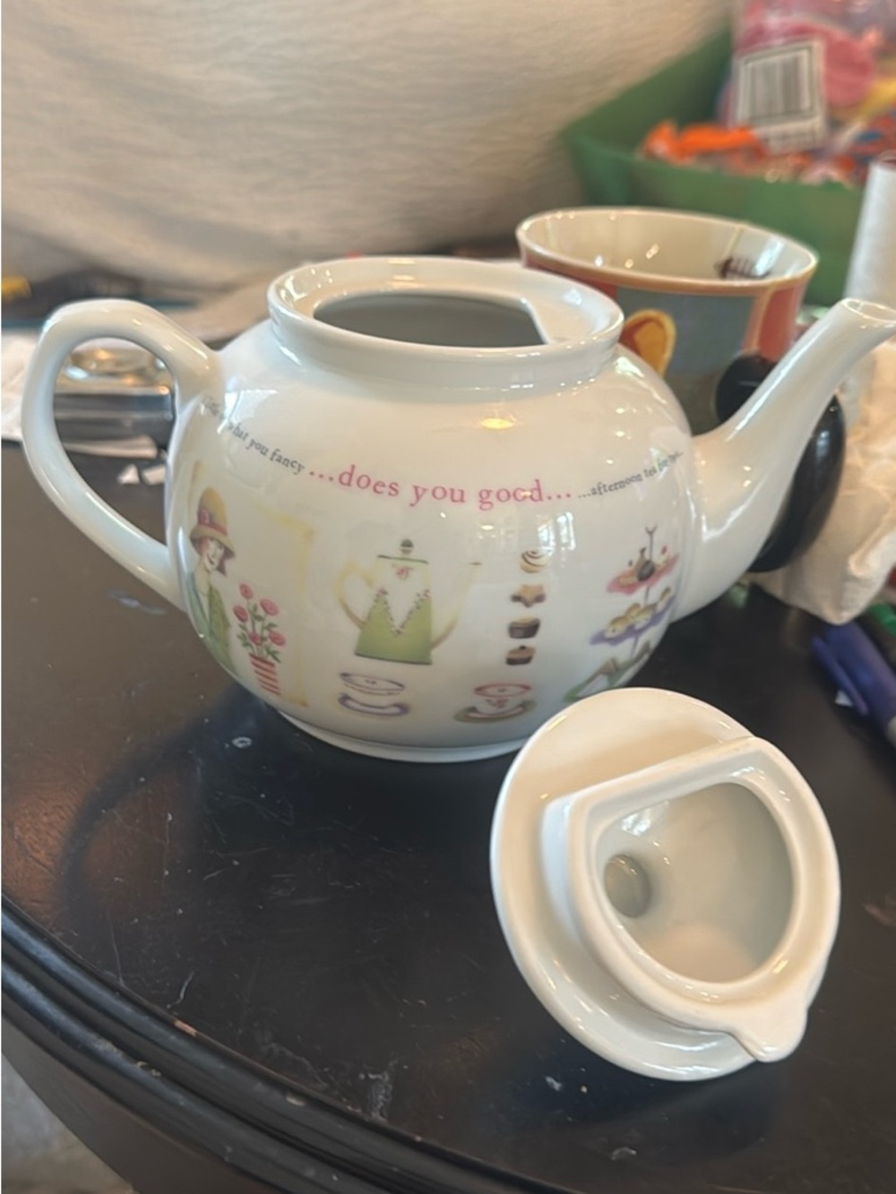 Decorative White Ceramic Teapot with Pastel Accent Design